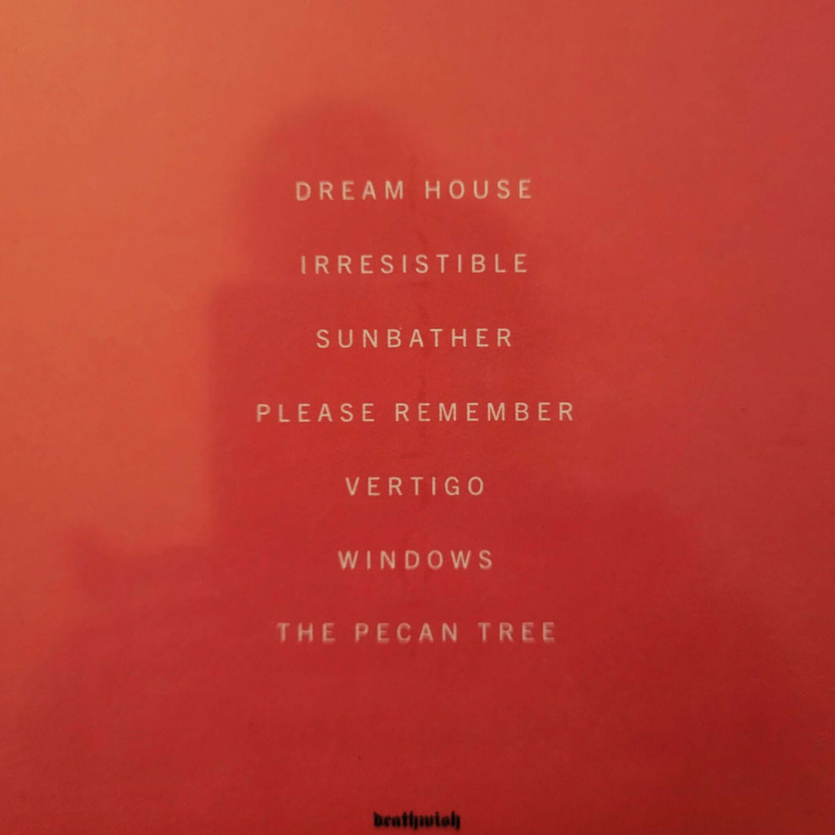 A square red-orange graphic featuring the list of SUNBATHER album tracks in white text, including 'Dream House', 'Irresistible', 'Sunbather', 'Please Remember', 'Vertigo', 'Windows', and 'The Pecan Tree'.