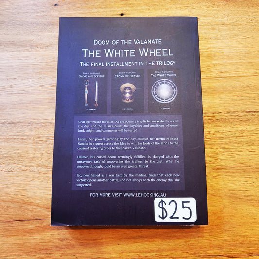 The back cover of the book 'Doom of the Valanate: The White Wheel' by L. E. Hocking