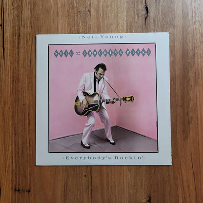 Neil Young and the Shocking Pinks - Everybody's Rockin' (Used - NM) album cover featuring Neil Young in a pink background.