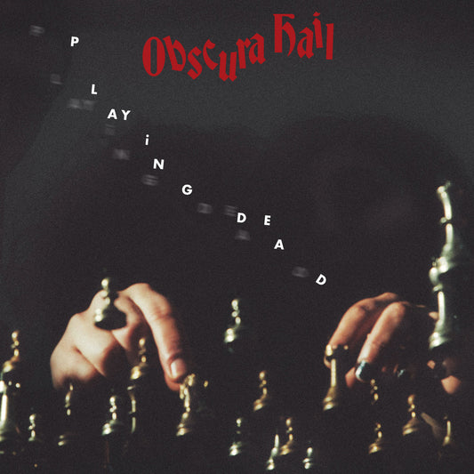 Album cover art for Obscura Hail, featuring the title in red gothic font at the top and white letters spelling 'PLAYING DEAD' arranged diagonally across a dark scene with human hands holding chess pieces.