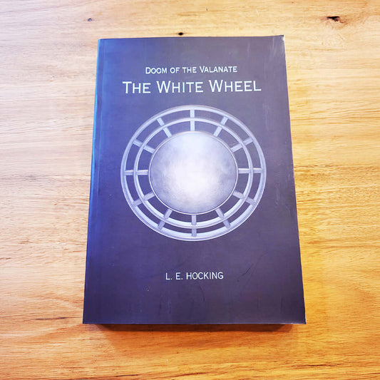 The front cover of the book 'Doom of the Valanate: The White Wheel' by L. E. Hocking